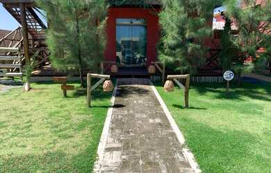 Imagem: A casa possui 2 Dormitórios, 1 Vaga na garagem e está localizado