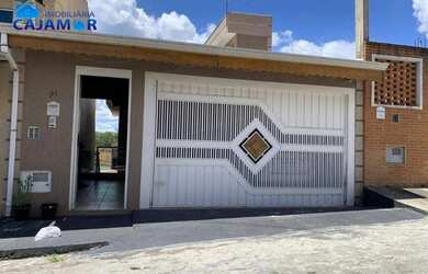 Imagem: A casa possui 4 Dormitórios, 3 Banheiros, 3 Vagas na garagem