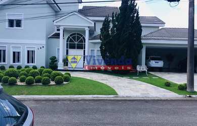 Imagem: A casa em condomínio possui 4 Dormitórios, 5 Banheiros, 4