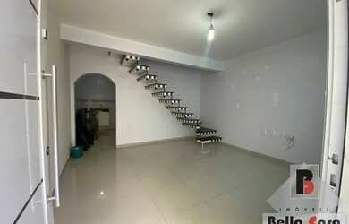 Imagem: A casa possui 2 Dormitórios, 3 Banheiros, 1 Vaga na garagem