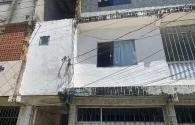 Imagem: A casa possui 2 Dormitórios e 2 Banheiros e está localizado