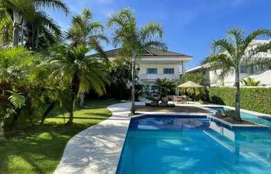 Imagem: A casa em condomínio para alugar possui 5 Dormitórios, 5 Banheiros