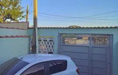 Imagem: A casa possui 2 Dormitórios, 2 Vagas na garagem e está localizado