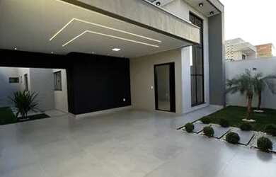 Imagem: A casa e possui 3 Dormitórios, 2 Banheiros, 3 Vagas na garagem