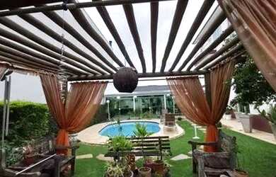 Imagem: A casa em condomínio possui 5 Dormitórios, 5 Banheiros, 5