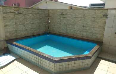 Imagem: A casa em condomínio possui 4 Dormitórios, 4 Banheiros, 4