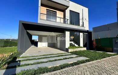 Imagem: A casa em condomínio possui 3 Dormitórios, 3 Banheiros, 2