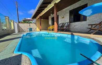 Imagem: A casa possui 5 Dormitórios, 4 Banheiros, 2 Vagas na garagem