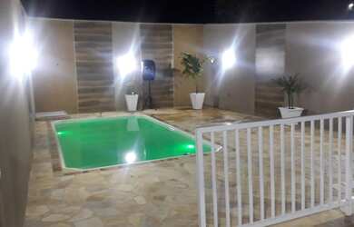 Imagem: A casa possui 2 Dormitórios, 1 Vaga na garagem e está localizado