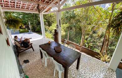 Imagem 7: Aldeia casa linda com 3 terrenos , possuindo jardim maravilhoso e piscina