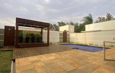 Imagem: A casa em condomínio possui 4 Dormitórios, 5 Banheiros, 4