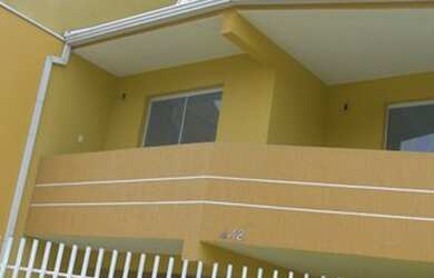 Imagem: A casa possui 3 Dormitórios, 3 Banheiros, 2 Vagas na garagem