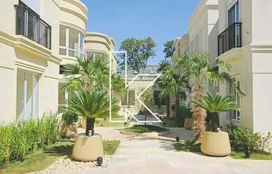 Imagem: A casa possui 4 Dormitórios, 5 Banheiros, 5 Vagas na garagem