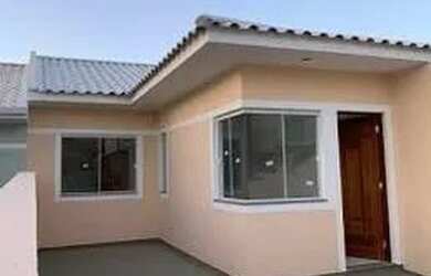 Imagem: A casa possui 2 Dormitórios, 2 Banheiros, 2 Vagas na garagem