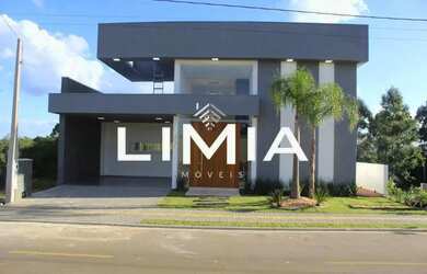 Imagem: A casa possui 3 Dormitórios, 3 Banheiros, 4 Vagas na garagem