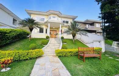 Imagem: A casa em condomínio possui 4 Dormitórios, 5 Banheiros, 4