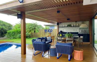 Imagem: A casa possui 5 Dormitórios, 5 Banheiros, 5 Vagas na garagem