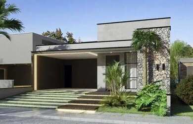 Imagem: A casa possui 3 Dormitórios, 5 Banheiros, 4 Vagas na garagem