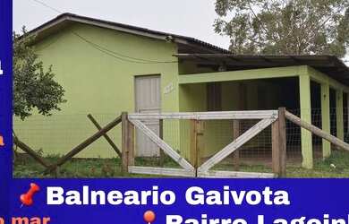 Imagem: A casa possui 2 Dormitórios, 1 Banheiro, 2 Vagas na garagem