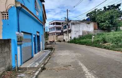 Imagem: A casa possui 3 Dormitórios, 2 Banheiros, 1 Vaga na garagem