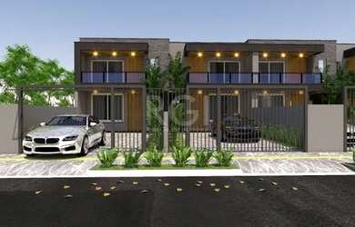 Imagem: A casa possui 3 Dormitórios, 3 Banheiros, 4 Vagas na garagem