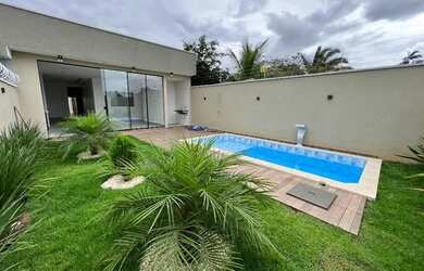 Imagem: A casa possui 3 Dormitórios, 4 Banheiros, 4 Vagas na garagem