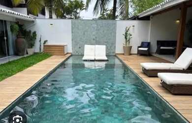 Imagem: A casa em condomínio possui 4 Dormitórios, 5 Banheiros, 4