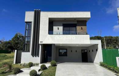 Imagem: A casa em condomínio possui 4 Dormitórios, 4 Banheiros, 2