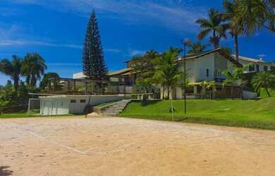 Imagem: A casa possui 5 Dormitórios, 5 Banheiros, 5 Vagas na garagem