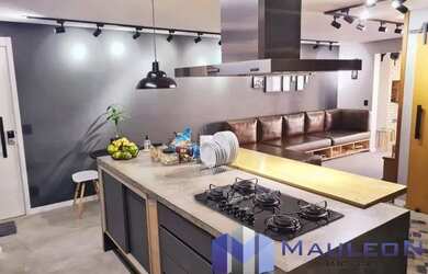 Imagem: O apartamento possui 3 Dormitórios, 4 Banheiros, 2 Vagas na