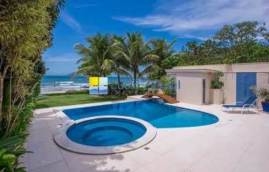 Imagem: A casa possui 5 Dormitórios, 5 Banheiros, 3 Vagas na garagem