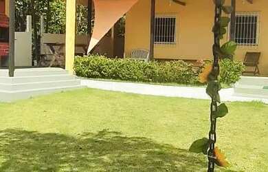 Imagem: A casa possui 3 Dormitórios, 3 Banheiros, 5 Vagas na garagem