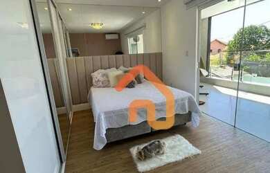 Imagem 14: Casa finamente decorada,estilo contemporaneo localizada no inicio da praia...