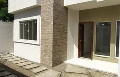 Imagem: A casa possui 2 Dormitórios, 2 Banheiros, 1 Vaga na garagem