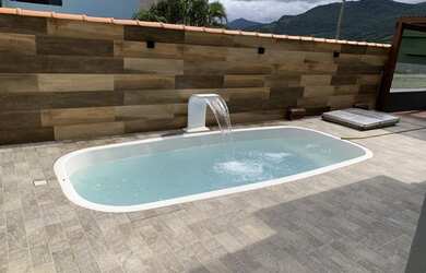 Imagem 5: Casa para venda tem 140 metros quadrados com 3 quartos em Ambrósio - Garopaba - SC