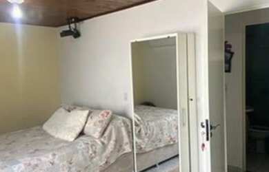 Imagem: A casa possui 2 Dormitórios, 2 Banheiros, 3 Vagas na garagem