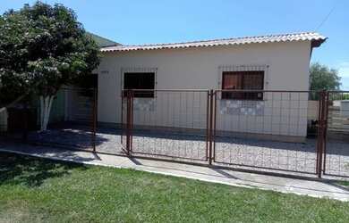 Imagem: A casa possui 2 Dormitórios, 1 Banheiro, 1 Vaga na garagem