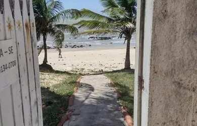 Imagem: A casa possui 4 Dormitórios, 4 Banheiros, 5 Vagas na garagem