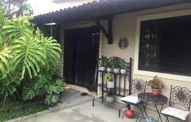 Imagem: A casa possui 3 Dormitórios, 3 Banheiros, 2 Vagas na garagem