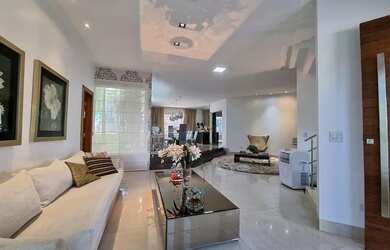 Imagem: A casa possui 4 Dormitórios, 4 Banheiros, 4 Vagas na garagem