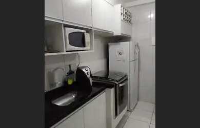 Imagem: O apartamento possui 2 Dormitórios, 1 Banheiro, 1 Vaga na garagem