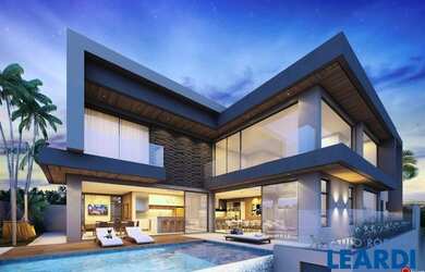 Imagem: A casa em condomínio possui 5 Dormitórios, 5 Banheiros, 3