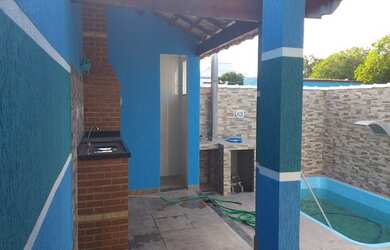 Imagem: A casa possui 2 Dormitórios, 3 Banheiros, 4 Vagas na garagem