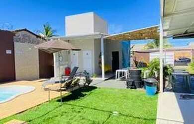 Imagem: A casa possui 1 Dormitório, 3 Banheiros, 5 Vagas na garagem