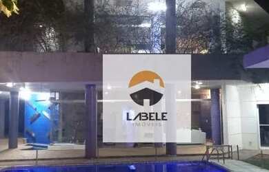 Imagem: A casa em condomínio possui 4 Dormitórios, 4 Banheiros, 5