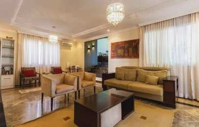 Imagem: A casa possui 3 Dormitórios, 3 Banheiros, 3 Vagas na garagem