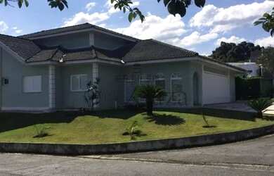 Imagem: A casa em condomínio possui 4 Dormitórios, 5 Banheiros, 5