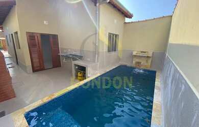 Imagem: A casa possui 2 Dormitórios, 2 Banheiros, 3 Vagas na garagem