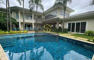 Imagem: A casa possui 5 Dormitórios, 5 Banheiros, 3 Vagas na garagem