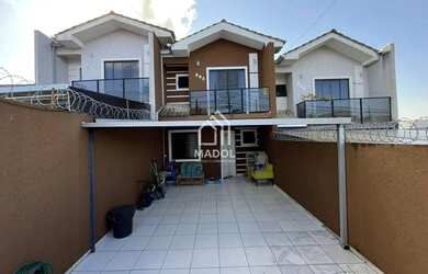 Imagem: A casa possui 3 Dormitórios, 2 Banheiros, 2 Vagas na garagem